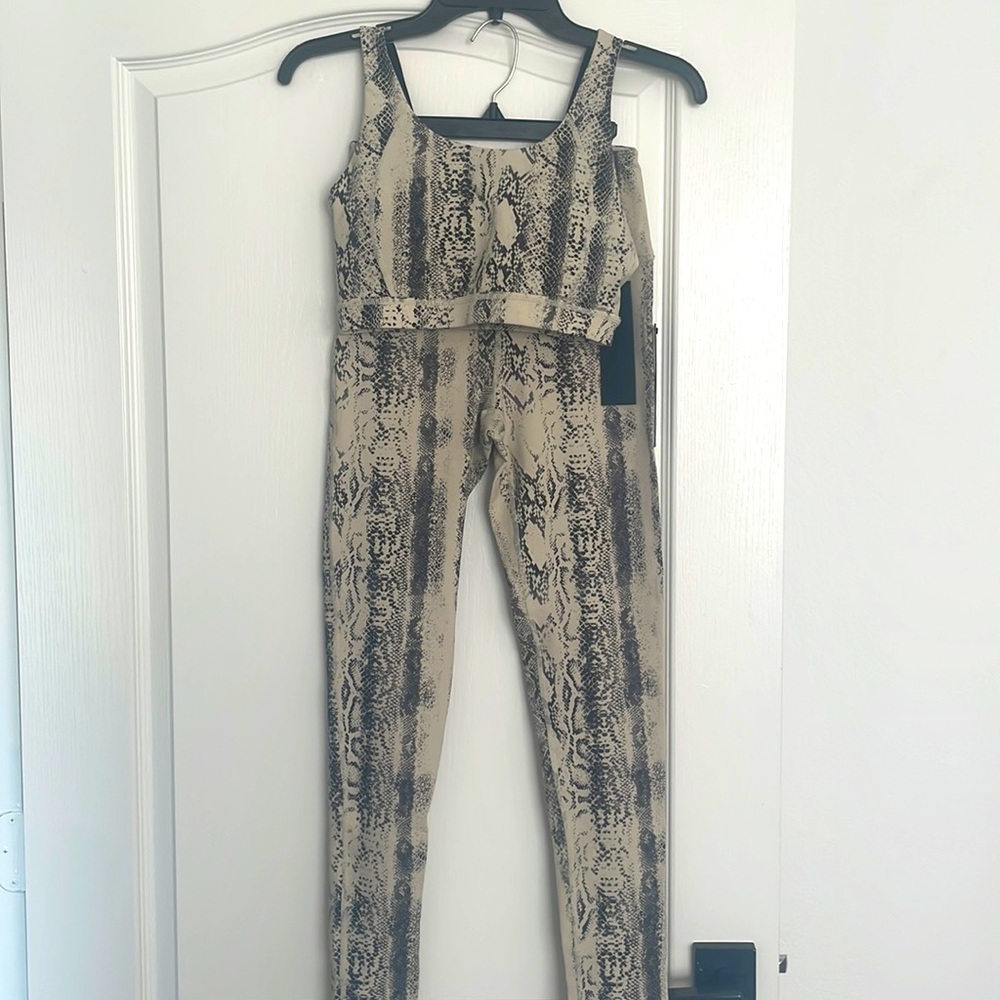 SMALL black & beige pant & bra workout set. 81% nylon, 19% spandex.